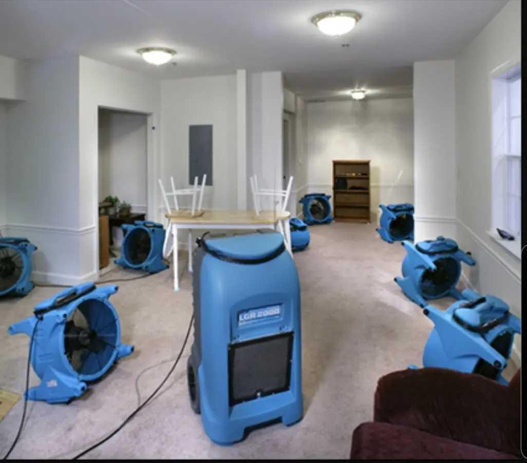 Air movers and dehumidifier setup for Water Damage Restoration in Alabaster